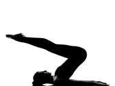 9799821-beautiful-caucasian-tall-woman-ballet-dancer-halasana-shoulder-stand-yoga-pose-full-length-on-studio